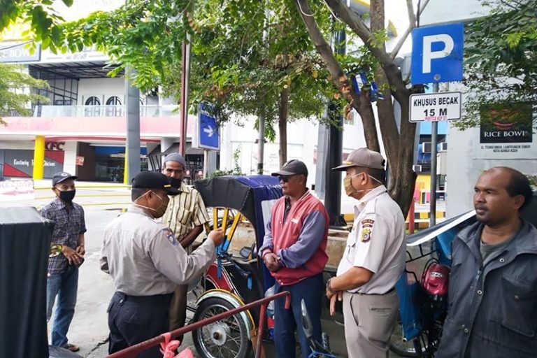 Polda Aceh Gencarkan Imbau Warga Gunakan Masker